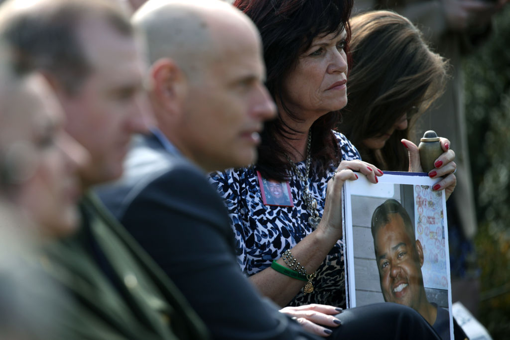 Relatives of victims killed by illegal immigrants listen as U.S. President Donald Trump speaks on border security during a Rose Garden event at the White House February 15, 2019 in Washington, DC. President Trump is expected to declare a national emergency to free up federal funding to build a wall along the southern border. (Photo by Alex Wong/Getty Images)