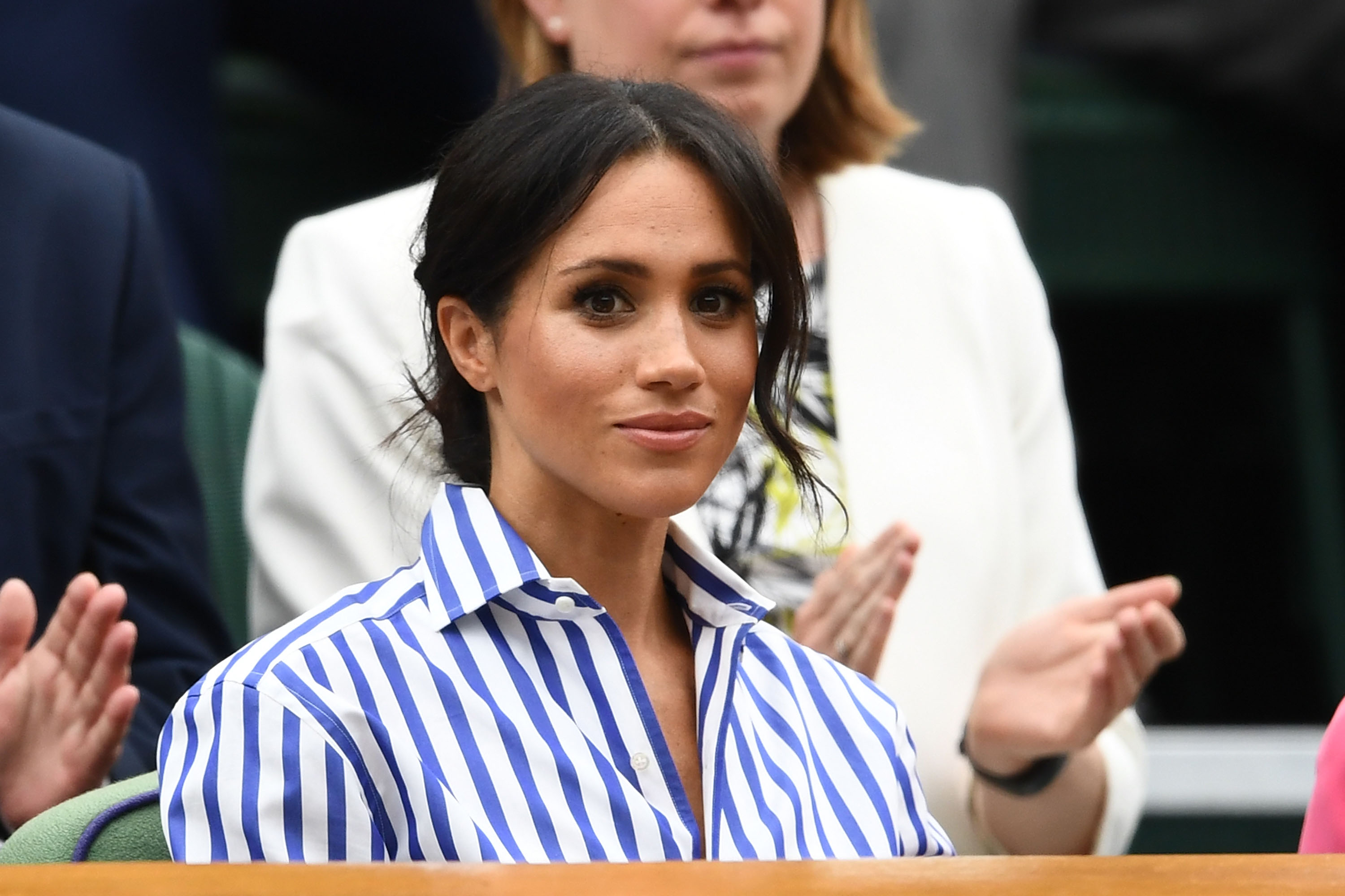 Meghan, Duchess of Sussex attends day twelve of the Wimbledon Lawn Tennis Championships at All England Lawn Tennis and Croquet Club on July 14, 2018 in London, England.