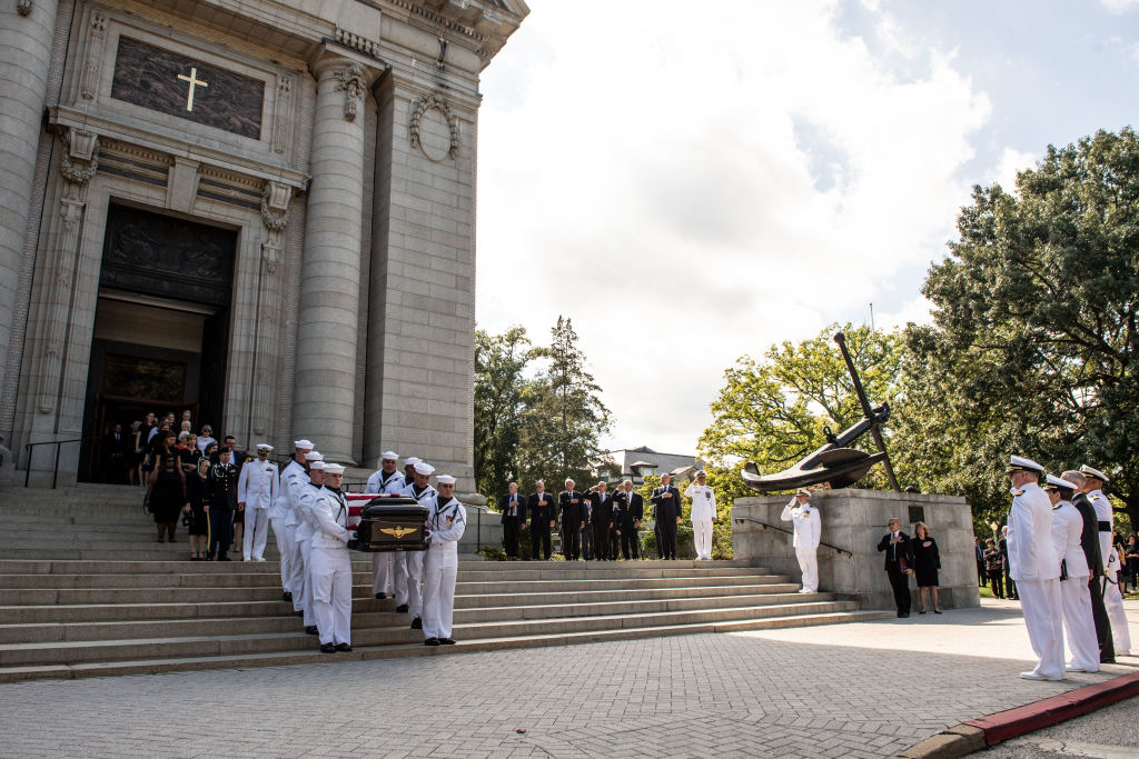 Navy Body Bearers move the casket of the late Senator John McCain to a horse-drawn caisson after his funeral service at the United States Naval Academy Chapel, September 2, 2018 in Annapolis, Maryland. (Photo by Mass Communication Specialist 2nd Class Nathan Burke/U.S. Navy via Getty Images)