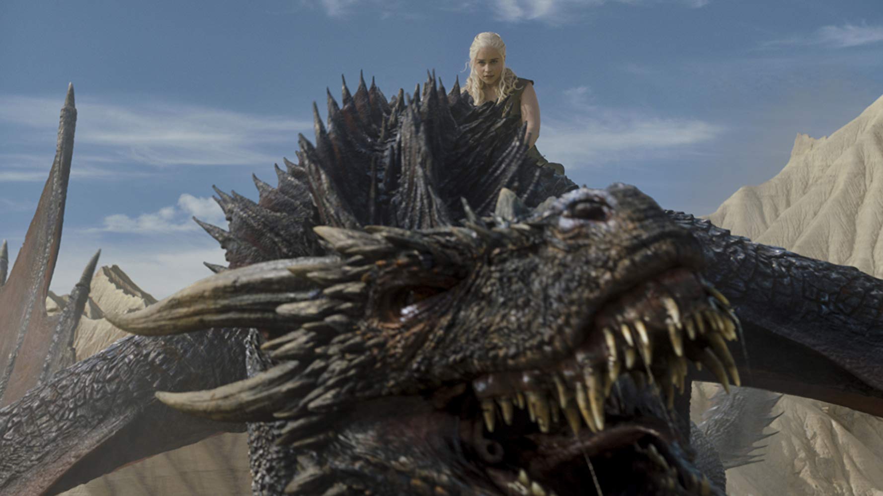Emilia Clarke (Daenerys Targaryen) riding Drogon into battle in 'Game of Thrones'.
(Source: IMDB)