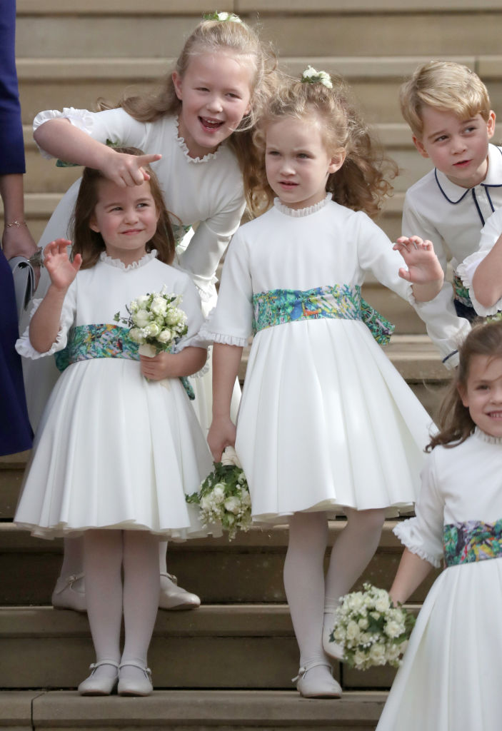 Bridesmaids Princess Charlotte of Cambridge, Savannah Phillips, Maud Windsor and page boy Prince George of Cambridge on the steps after the wedding of Princess Eugenie of York and Jack Brooksbank at St. George's Chapel on October 12, 2018, in Windsor, England. (Getty Images)