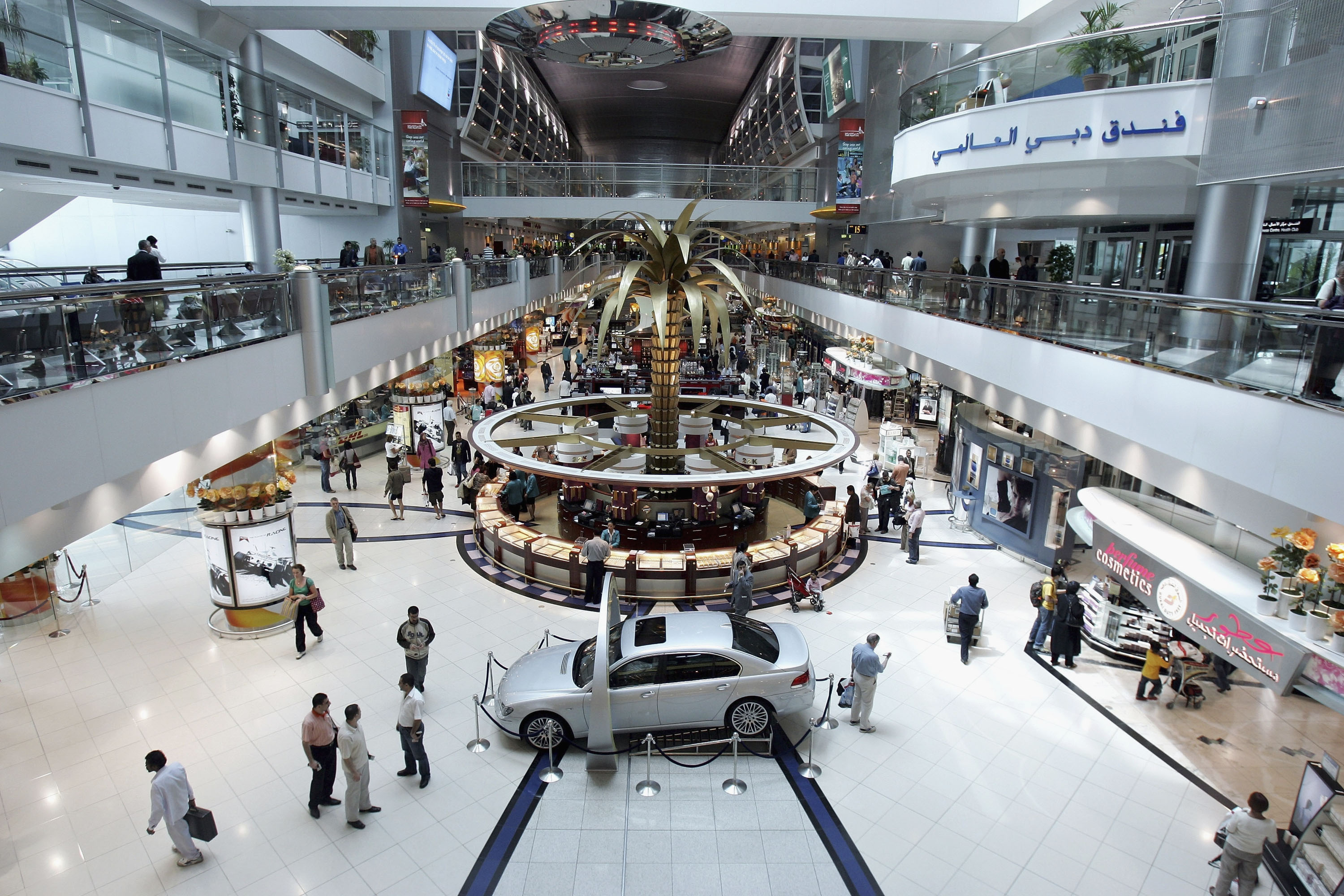 People wander around Dubai Duty Free at Dubai Airport on April 3, 2007 in Dubai, United Arab Emirates. Commerce and Industry is currently thriving in Dubai.