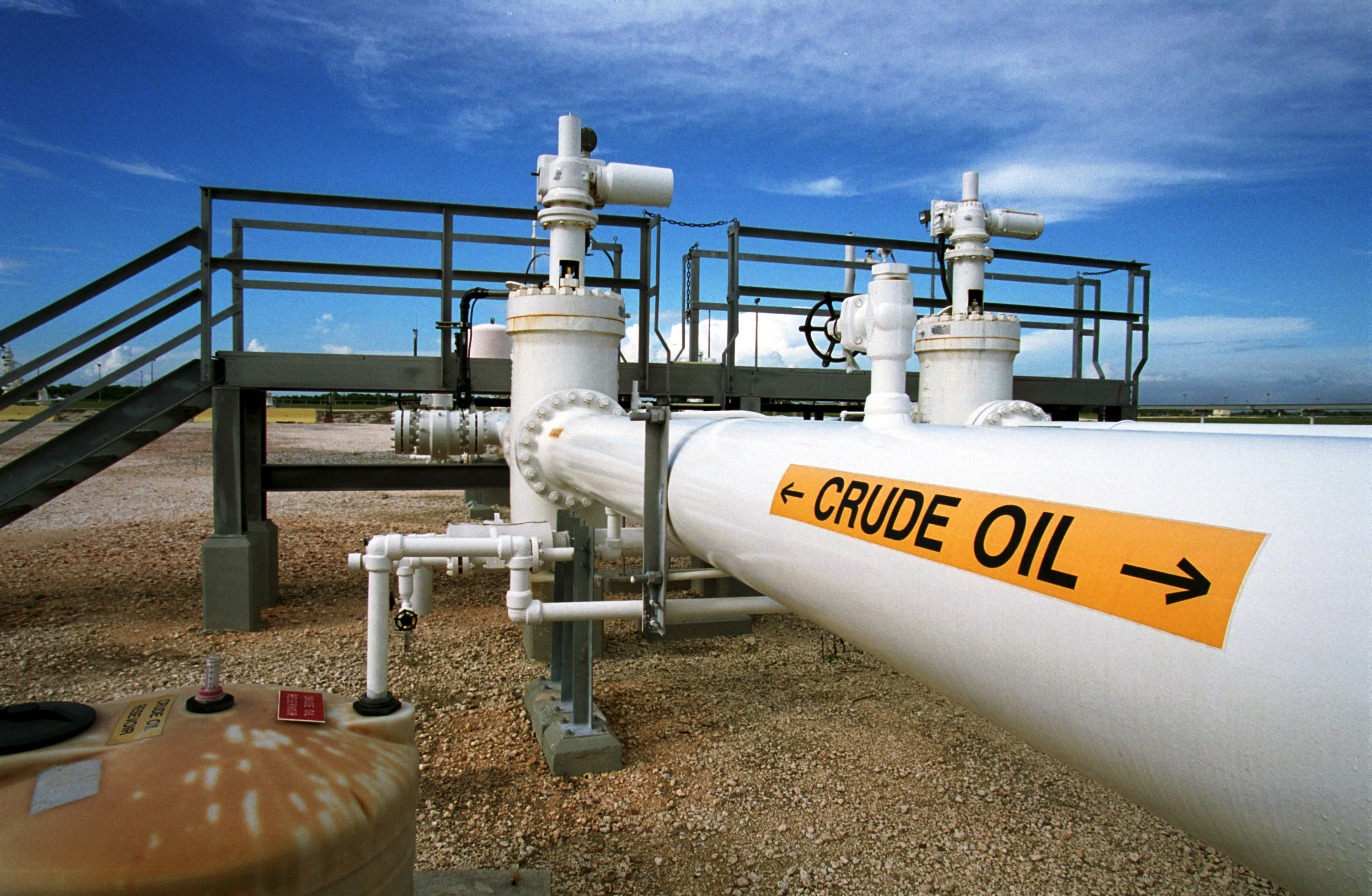 A pipeline carries oil September 20, 2000 at the Federal Strategic Petroleum Reserve facility known as Big Hill near Beaumont, Texas.