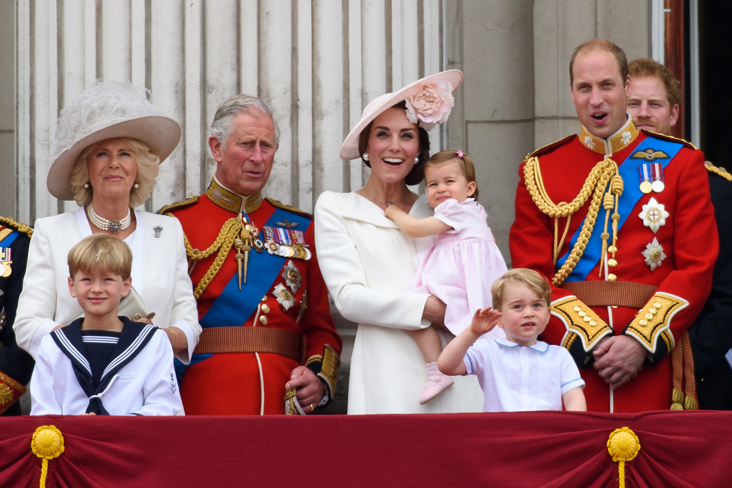 (L-R) Camilla, Duchess of Cornwall, Prince Charles of Wales, Catherine, Duchess of Cambridge, Princess Charlotte of Cambridge, Prince George Of Cambridge and Prince William, Duke of Cambridge watch a fly past during the Trooping the Colour, this year marking the Queen's 90th birthday at The Mall on June 11, 2016 in London, England. The ceremony is Queen Elizabeth II's annual birthday parade and dates back to the time of Charles II in the 17th Century when the Colours of a regiment were used as a rallying point in battle.