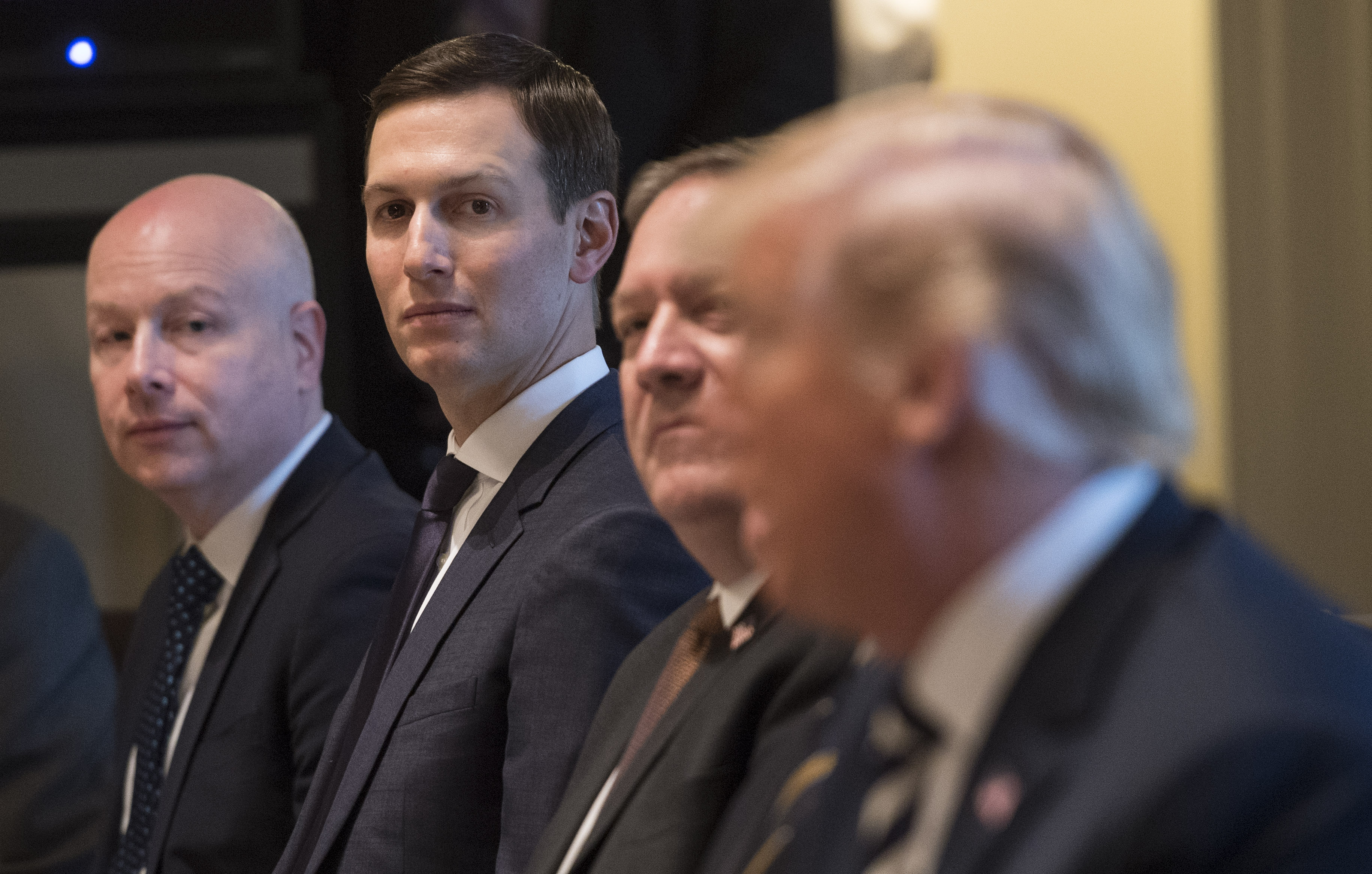 White House advisor Jared Kushner, listens as President Donald Trump holds a working lunch with Crown Prince Mohammed bin Salman of the Kingdom of Saudi Arabia in the Oval Office at the White House on March 20, 2018 in Washington, D.C.
