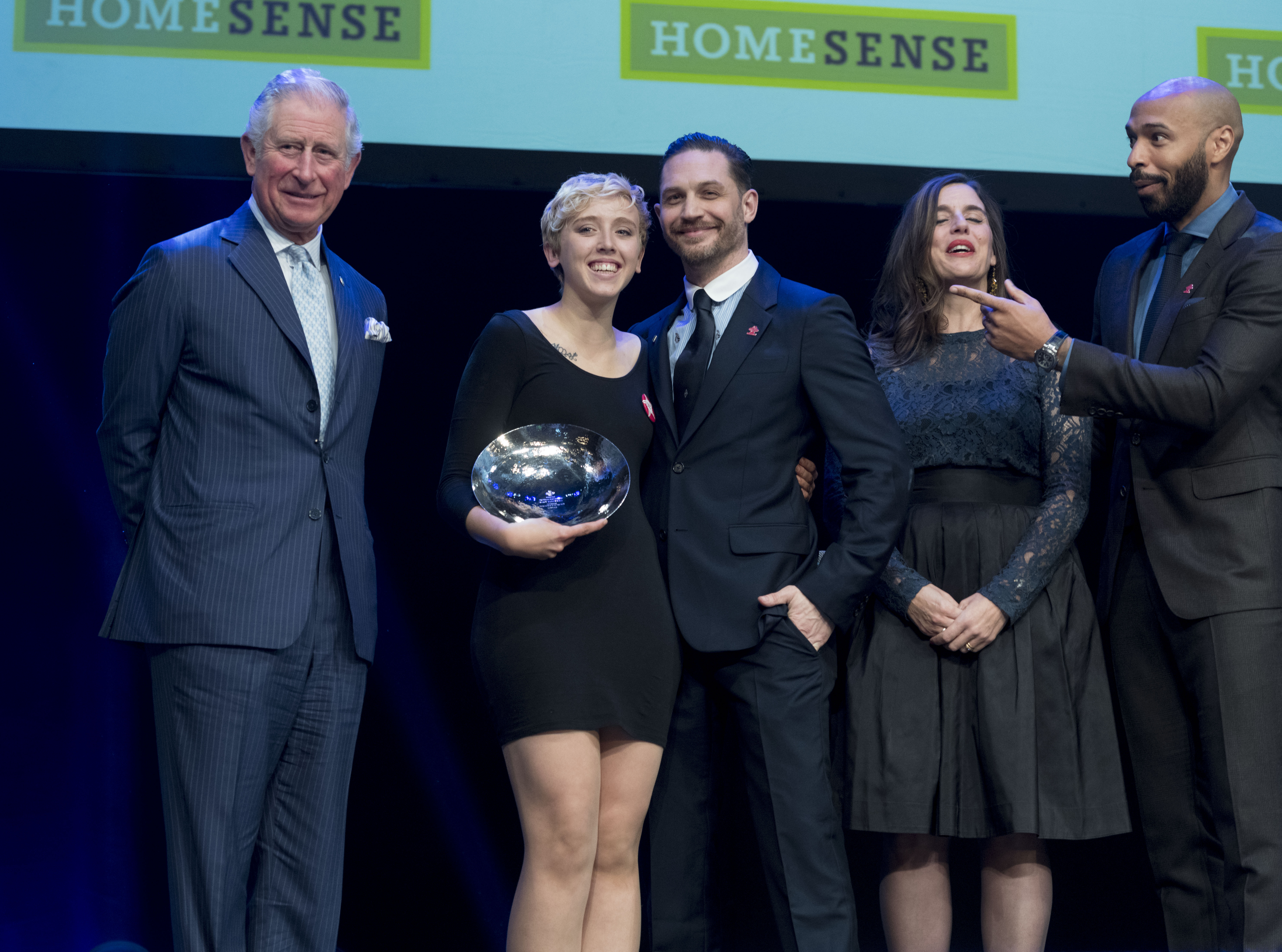 Prince Charles, Prince of Wales, with Young Achiever of the Year winner Daisy McDonnell and Tom Hardy at The Prince's Trust Awards at The London Palladium on March 6, 2018, in London, England. (Getty Images)