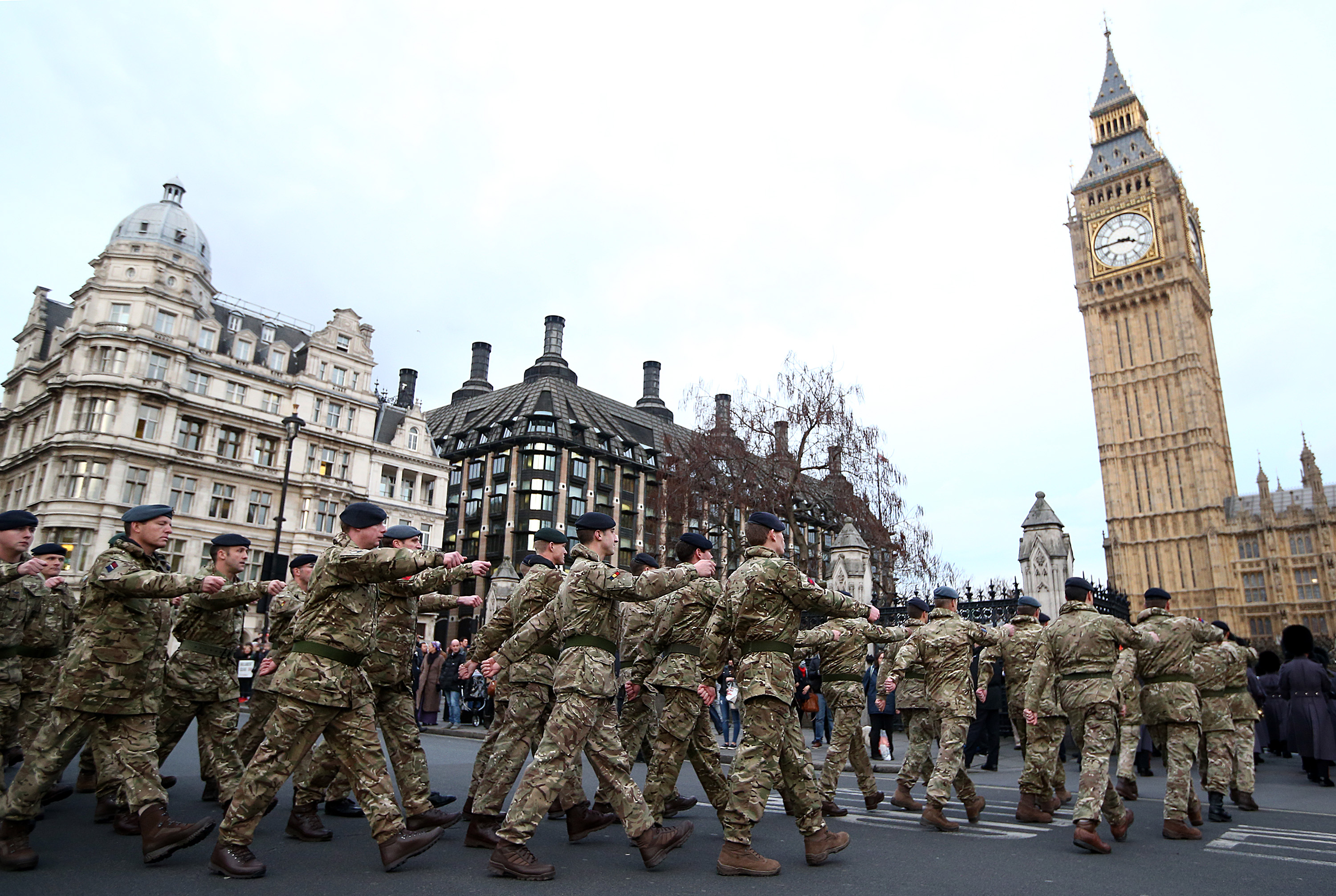 Military personnel march into the Houses of Parliament on January 26, 2015 in London, England. 120 military personnel from all three services were accompanied by the Band of the Grenadier Guards as they marched from Wellington Barracks to the Houses of Parliament. The march was led by Commander 102 Logistics Brigade Brigadier Darrell Amison, the final Commander of Joint Force Support for Operation Herrick and is their final march into their Houses of Parliament.