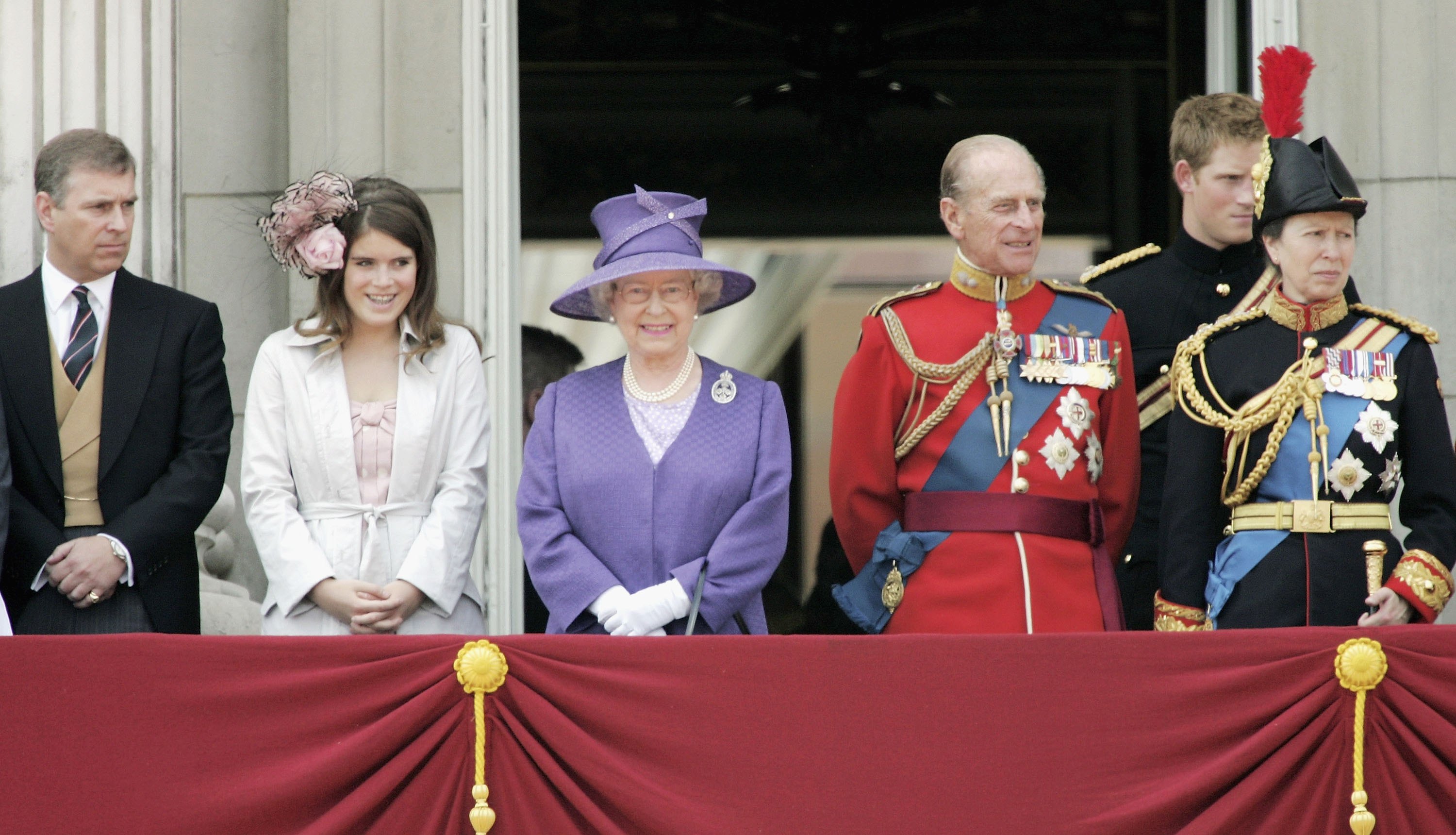 (L-R) Prince Andrew, Duke of York, Princess Eugenie, Queen Elizabeth II, Prince Philip, Duke of Edinburgh, Prince Harry and Princess Anne, Princess Royal stand on the balcony of Buckingham Palace following Trooping of The Queen's Colour of First Battalion Grenadier Guards, marking The Queen's official birthday, at Horse Guards Parade on June 17, 2006 in London, England.