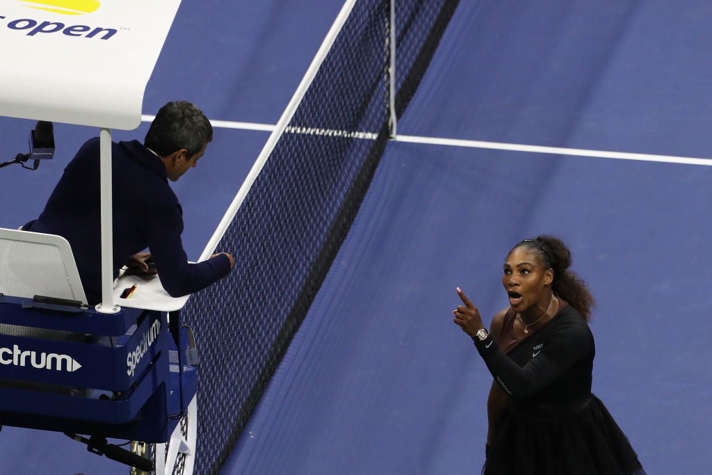 Serena Williams argues with umpire Carlos Ramos during her US Open Women's Singles final against Naomi Osaka on September 8, 2018 (Photo by Alex Pantling/Getty Images)