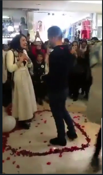 Screenshot of the viral video shows the woman overjoyed after being proposed. (Twitter)
