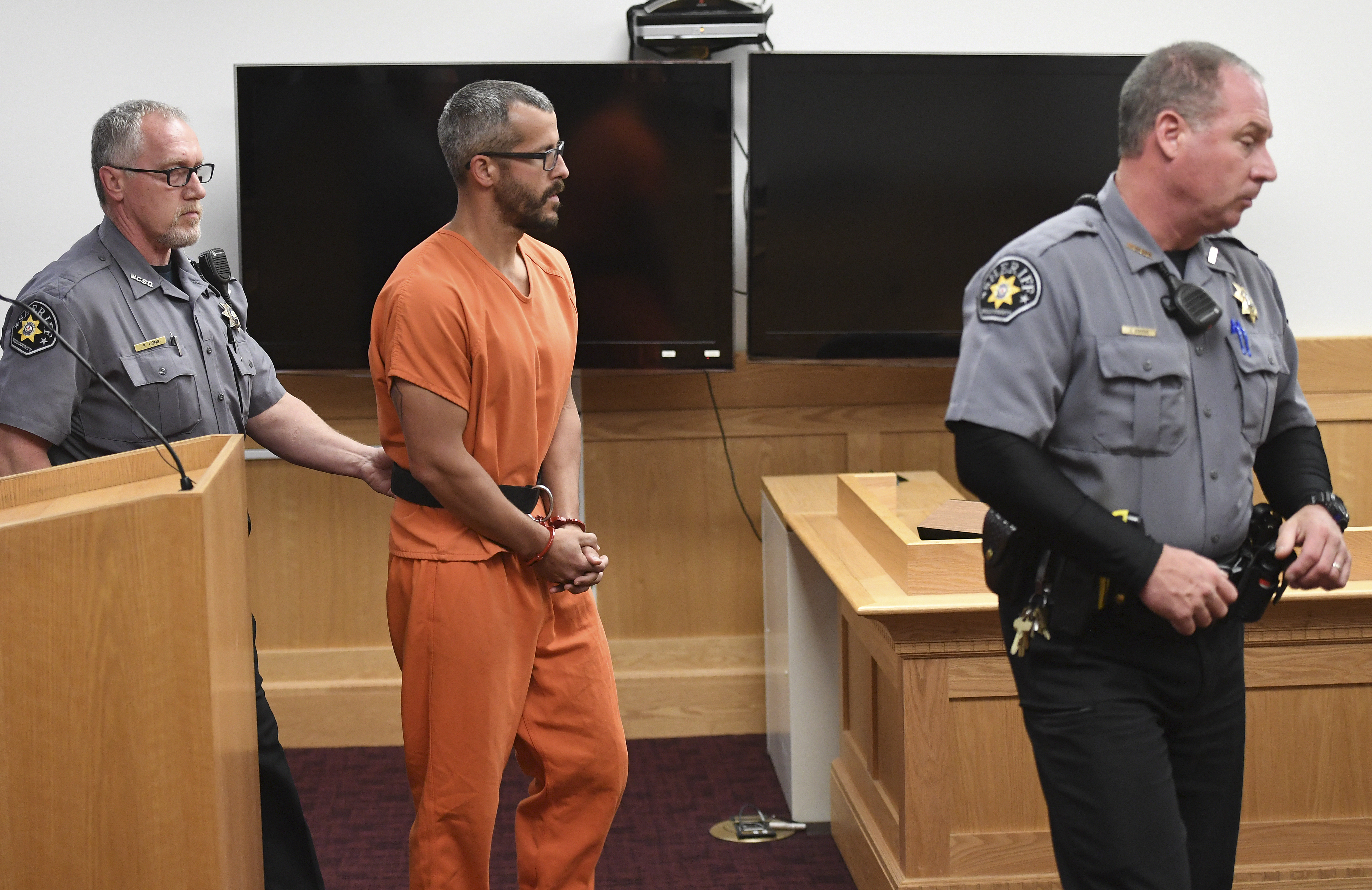 Christopher Watts is in court for his arraignment hearing at the Weld County Courthouse on August 21, 2018 in Greeley, Colorado. Watts faces nine charges, including several counts of first-degree murder of his wife and his two young daughters.