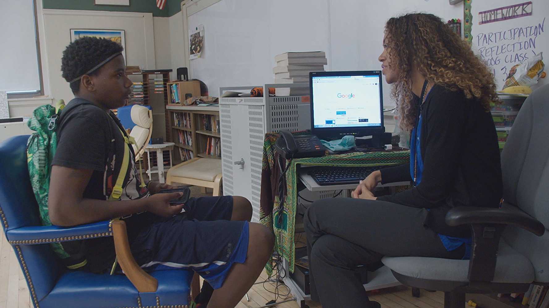 Teachers and administrators join the conversation in discussing the racial issues in schools. (IMDb)