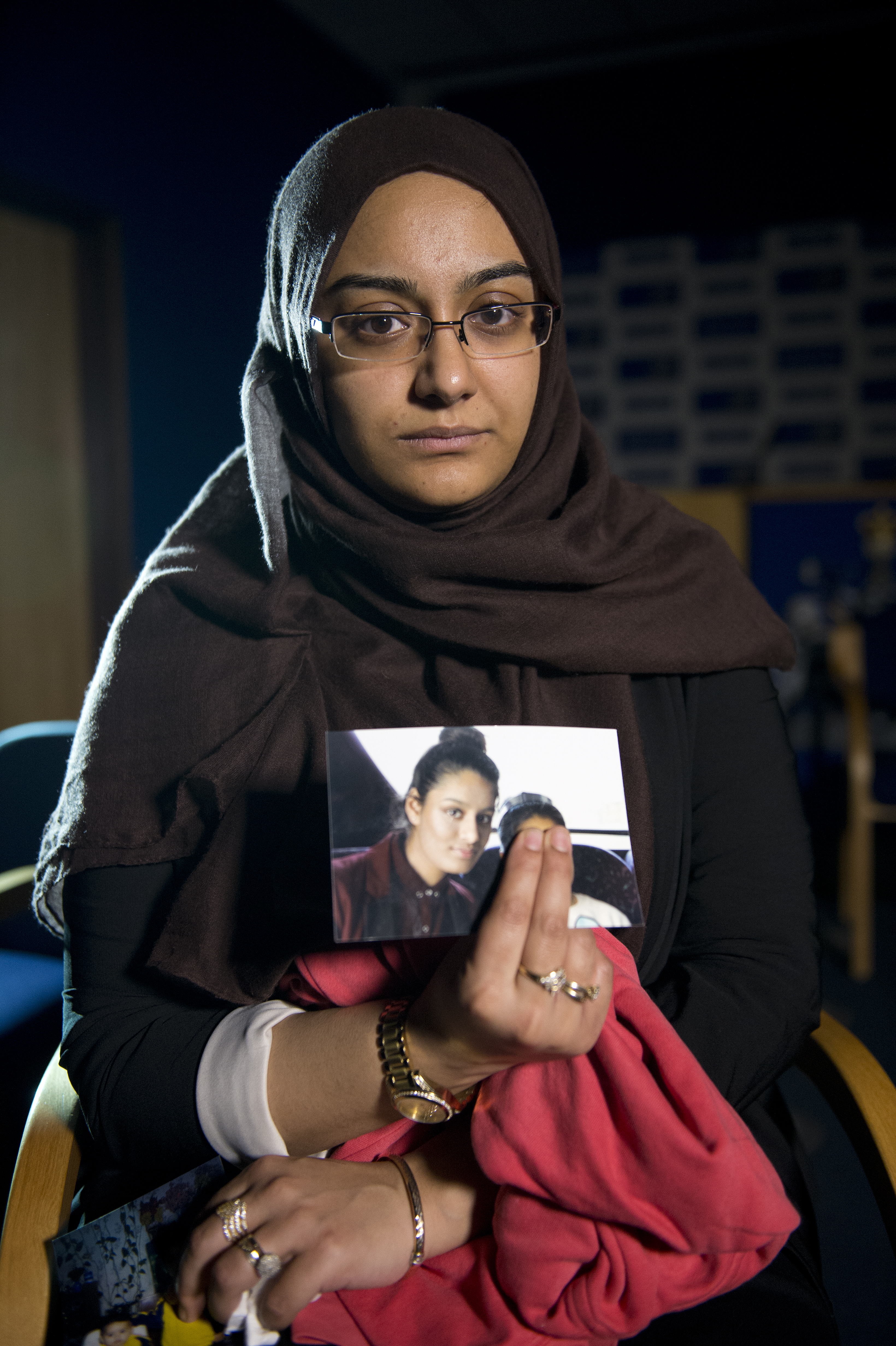 Renu Begum, eldest sister of Shamima Begum, 15, holds her sister's photo as she is interviewed by the media at New Scotland Yard, as the relatives of three missing schoolgirls believed to have fled to Syria to join Islamic State have pleaded for them to return home, on February 22, 2015, in London, England. Police are urgently trying to trace Shamima Begum, 15, Kadiza Sultana, 16, and 15-year-old Amira Abase after they flew to Istanbul in Turkey from Gatwick Airport on Tuesday (Source: Laura Lean - WPA Pool/Getty Images)