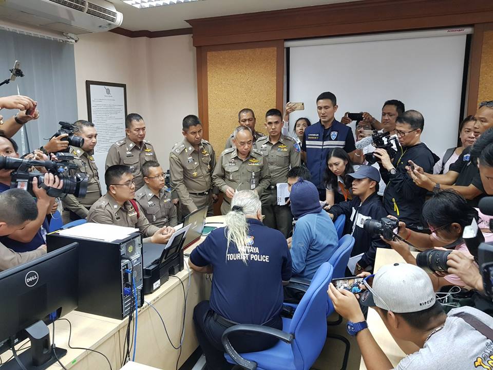 Zureikat (with blue hood) was caught at the Suvarnabhumi Airport in Bangkok (Source: Pattaya Cable TV/Facebook)