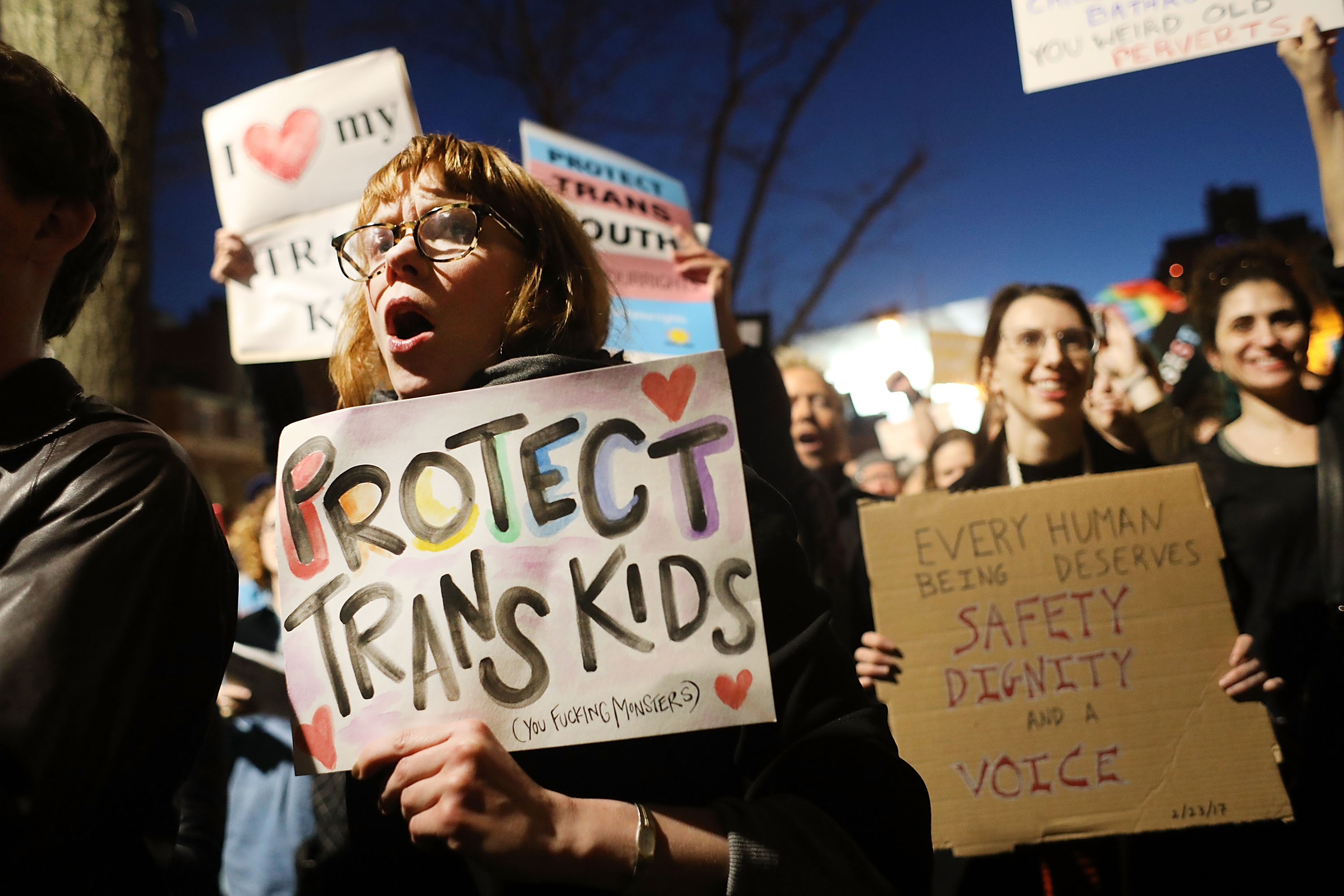 Hundreds protest a Trump administration announcement this week that rescinds an Obama-era order allowing transgender students to use school bathrooms matching their gender identities, at the Stonewall Inn on February 23, 2017 in New York City. Activists and members of the transgender community gathered outside the historic LGTB bar to denounce the new policy.
