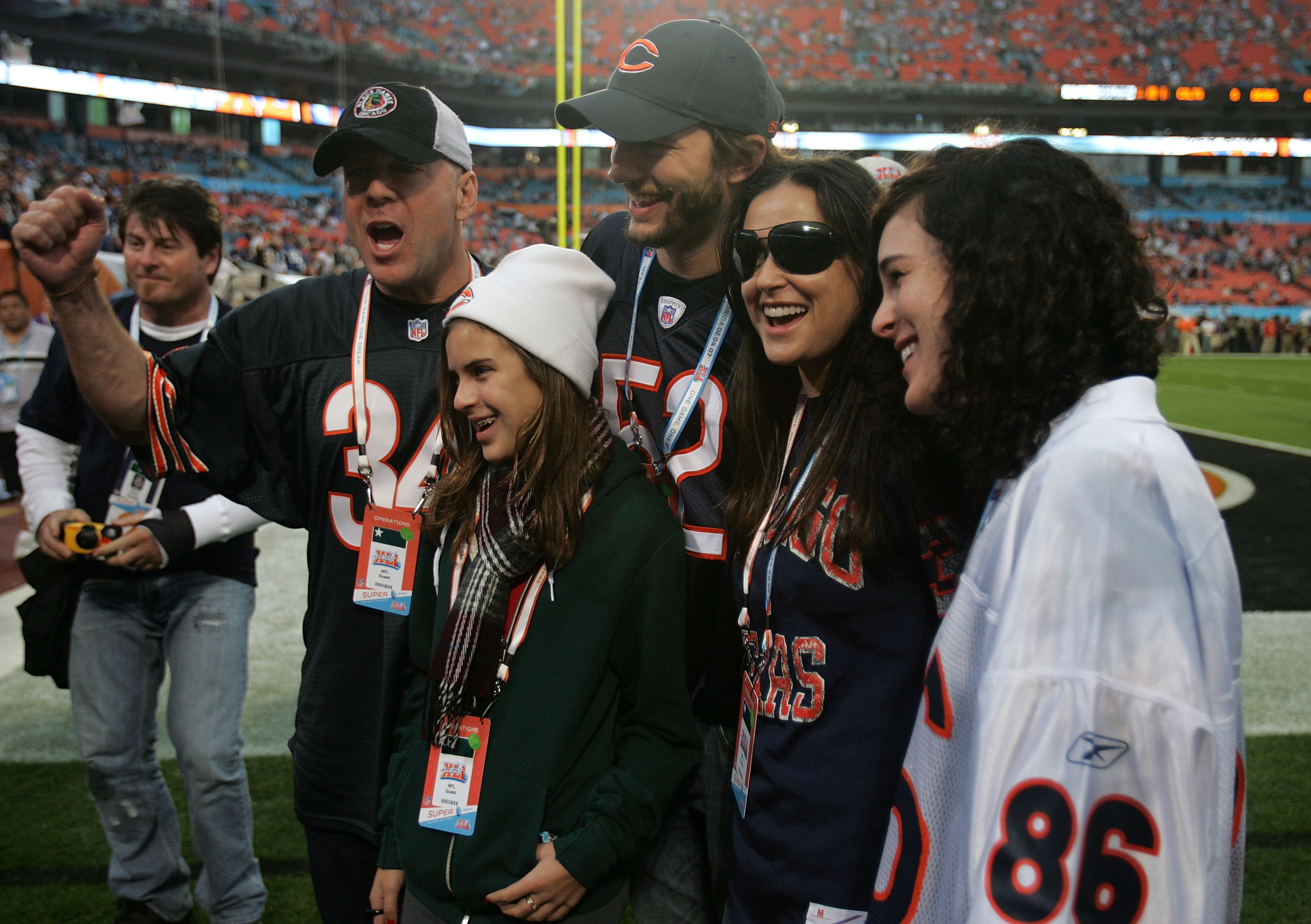 (L-R) Actor Bruce Willis, Tallulah Belle Willis, actor Ashton Kutcher, actress Demi Moore and Rumer Willis pose for a photo on field prior to the start of Super Bowl XLI between the Indianapolis Colts and the Chicago Bears on February 4, 2007 at Dolphin Stadium in Miami Gardens, Florida.