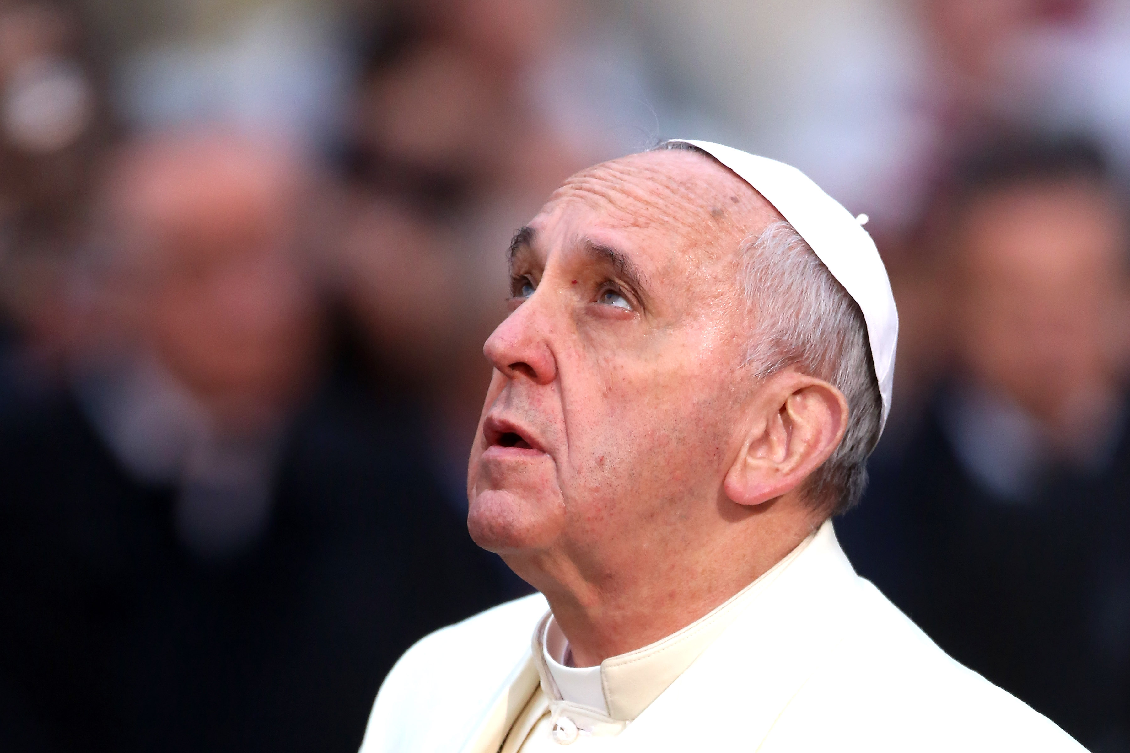 Pope Francis prays in front of the statue of the Immaculate Conceptionon at Spanish Steps December 8, 2013 in Rome, Italy. Following a tradition laid out by his predecessors, Pope Francis celebrated the Feast of the Immaculate Conception by travelling to Spanish Steps where he venerated the statue named for the Marian Feast.