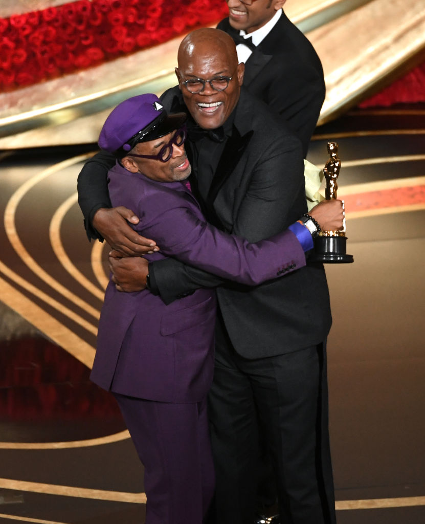 Spike Lee accepts the Adapted Screenplay award for 'BlacKkKlansman' from Samuel L. Jackson onstage during the 91st Annual Academy Awards at Dolby Theatre on February 24, 2019 in Hollywood, California. (Getty Images)