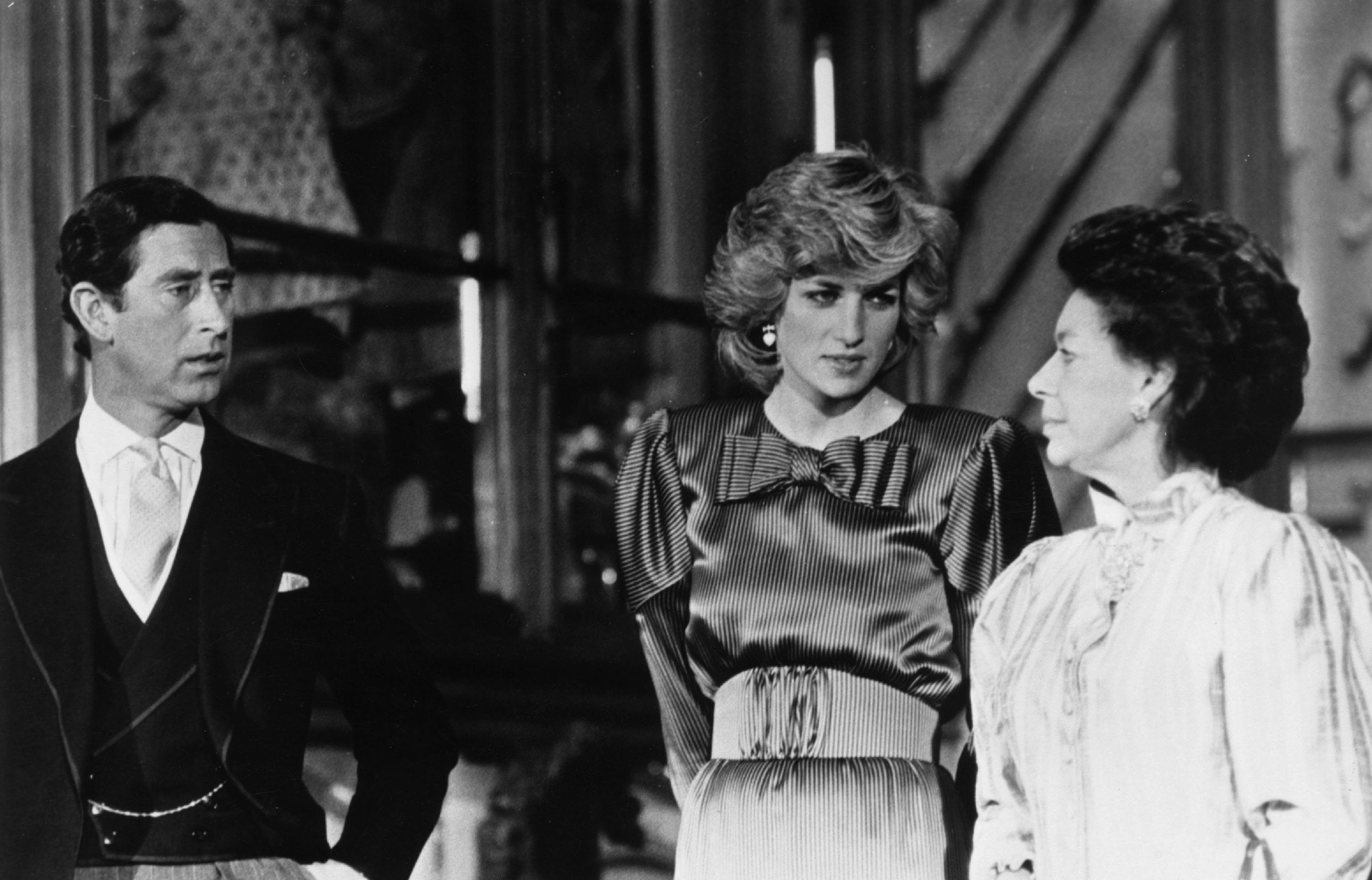 Charles, Prince of Wales (L) and Diana, Princess of Wales (1961-1997) stand with Princess Margaret Rose April 16, 1985 at Windsor Castle, Berkshire, ready to receive President Banda of Malawi for his State visit. Buckingham Palace announced that Princess Margaret died peacefully in her sleep at 1:30AM EST at the King Edward VII Hospital February 9, 2002 in London. (Photo by Getty Images)