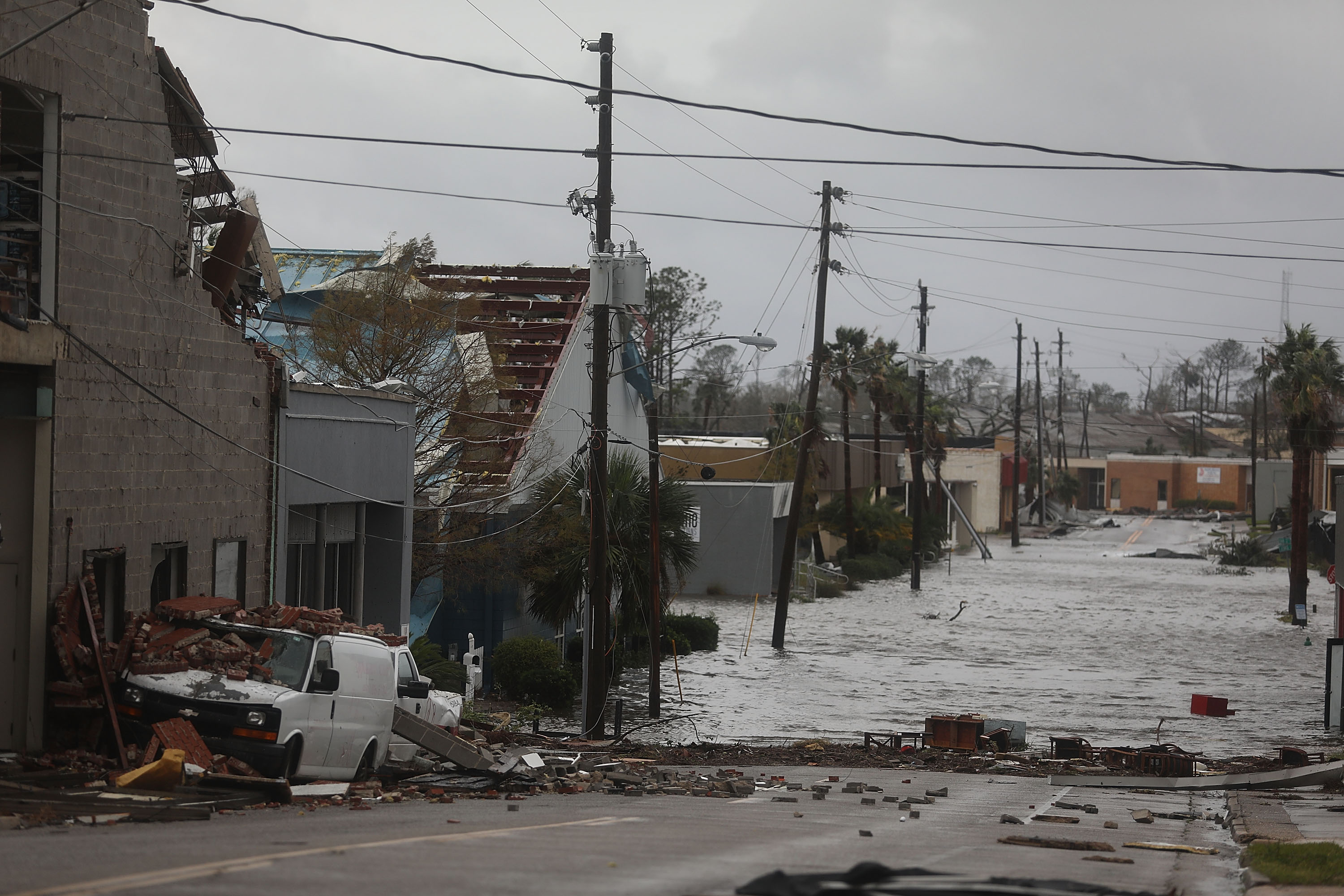 Damaged buildings and a flooded street are seen after hurricane Michael passed through the downtown area on October 10, 2018 in Panama City, Florida. The hurricane hit the Florida Panhandle as a category 4 storm.