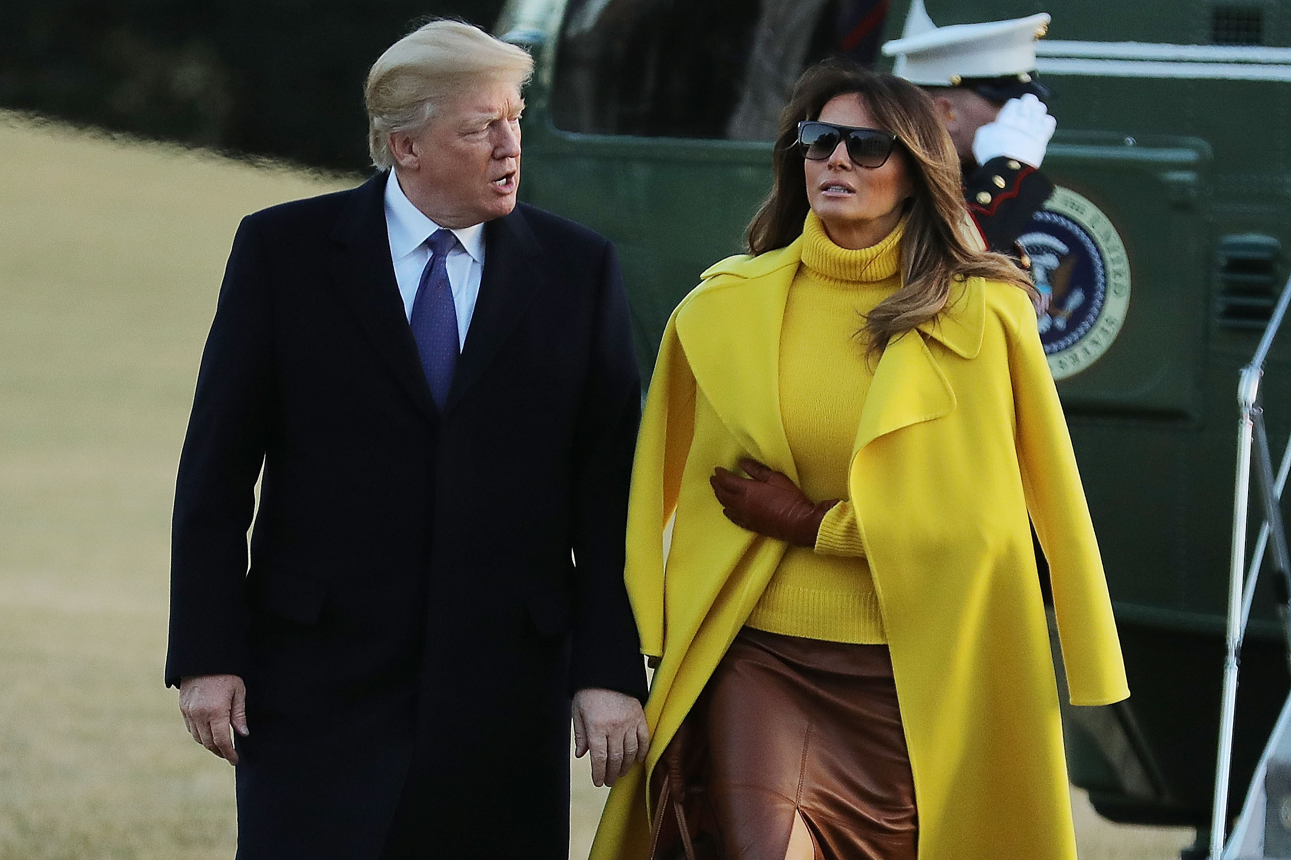 U.S. President Donald Trump (L) and first lady Melania Trump return to the White House after a day trip to Cincinnati, Ohio, February 5, 2018 in Washington, DC. While in Ohio President Trump delivered remarks after touring cylinder manufacturer Sheffer Corporation while the first lady visited patients and their families at Cincinnati Children's Hospital Medical Center.