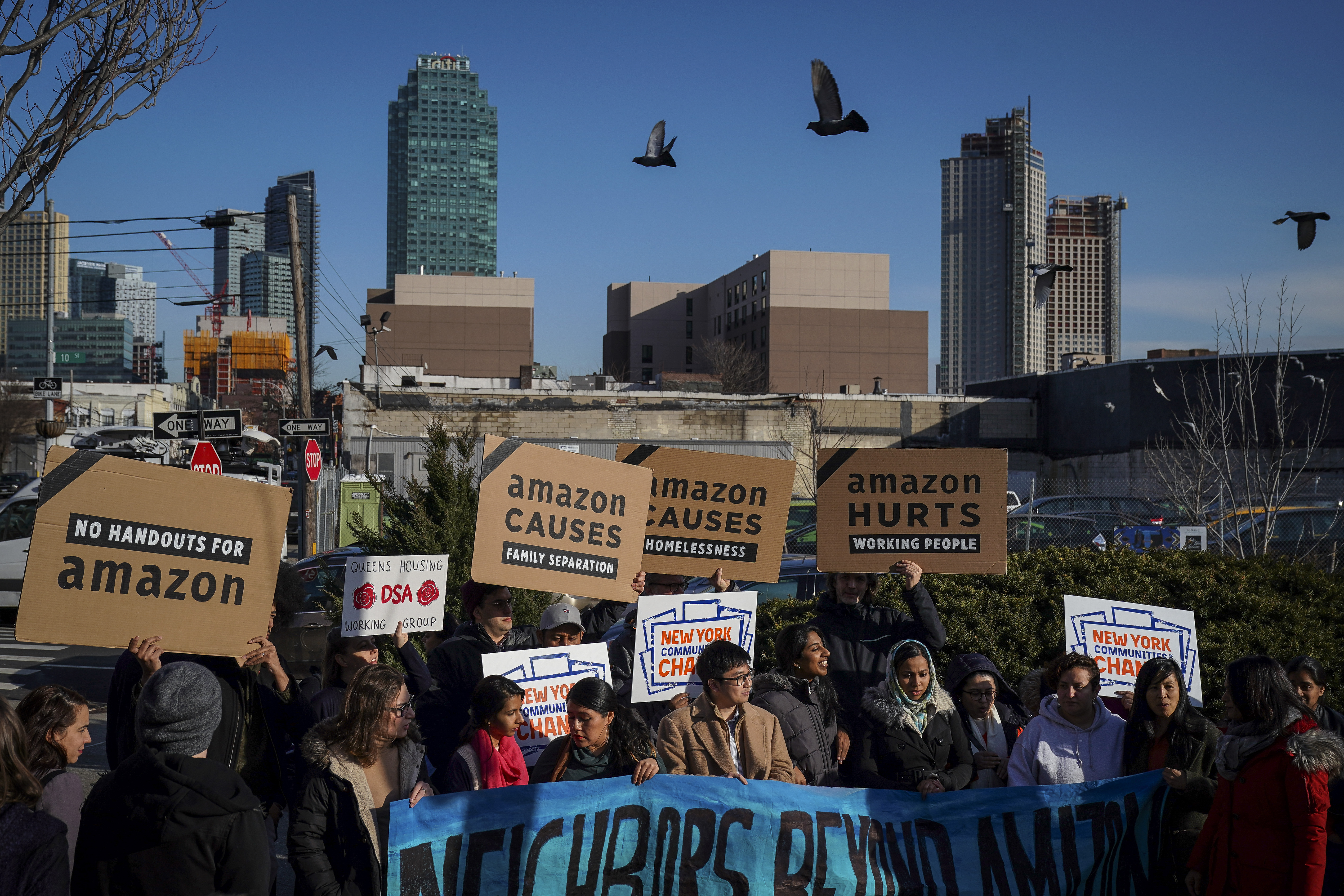 Activists and community members who opposed Amazon's plan to move into Queens rally in celebration of Amazon's decision to pull out of the deal, in the Long Island City neighborhood, February 14, 2019 in the Queens borough of New York City. (Getty Images)