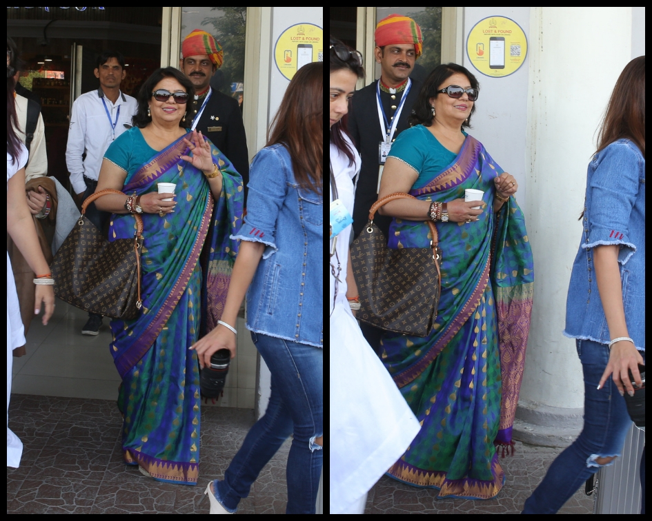 Madhu Chopra and other relatives were all smiling for the waiting cameras at the Jodhpur airport. (Source: Meaww)