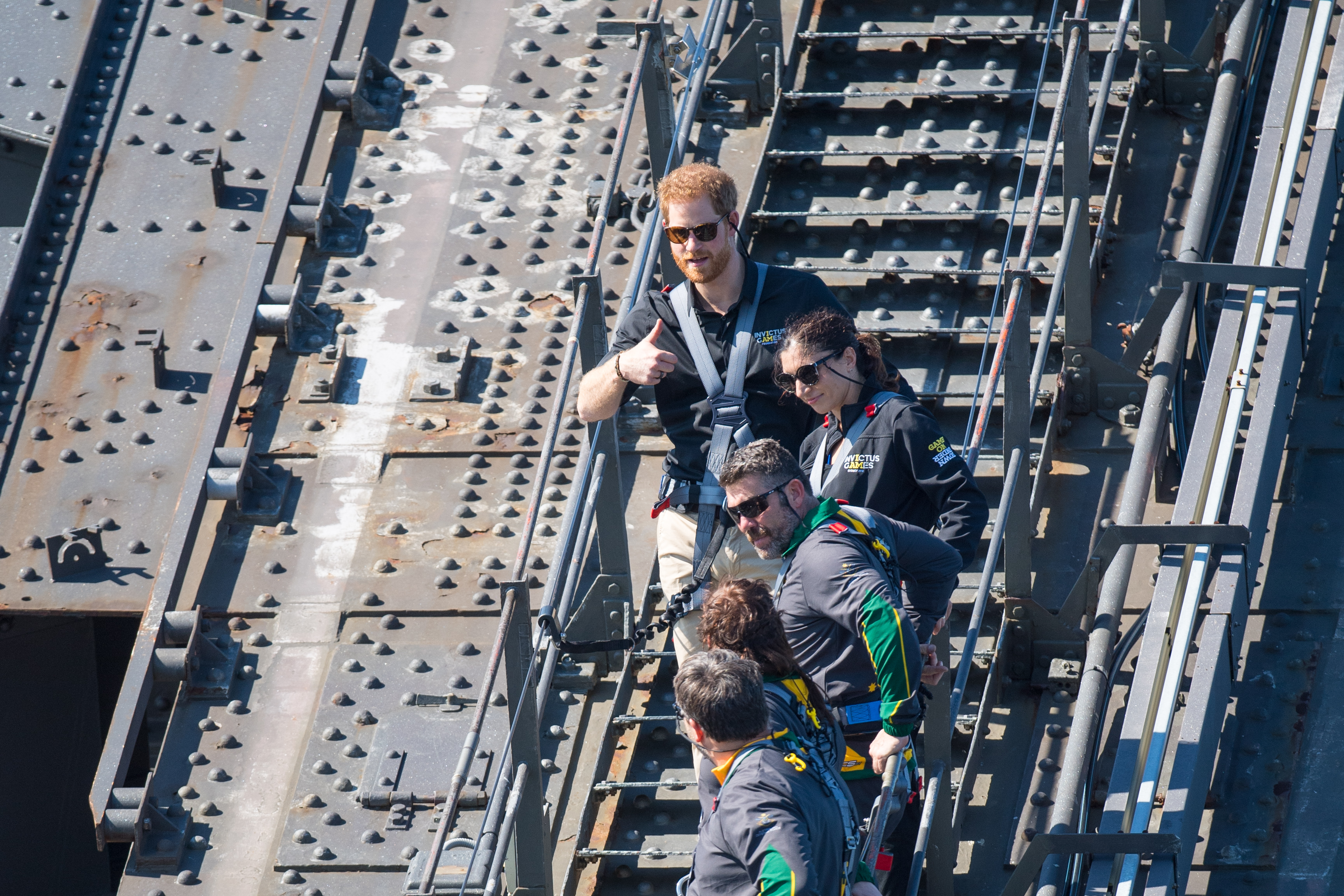 Prince Harry, Duke of Sussex climbs the Sydney Harbour Bridge with Prime Minister of Australia Scott Morrison and Invictus Games competitors on October 19, 2018, in Sydney, Australia. The Duke and Duchess of Sussex are on their official 16-day Autumn tour visiting cities in Australia, Fiji, Tonga, and New Zealand. (Getty Images)