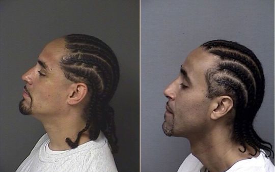 Richard Anthony Jones (right) and his lookalike Ricky Amos (left)
Source: Kansas Department of Corrections