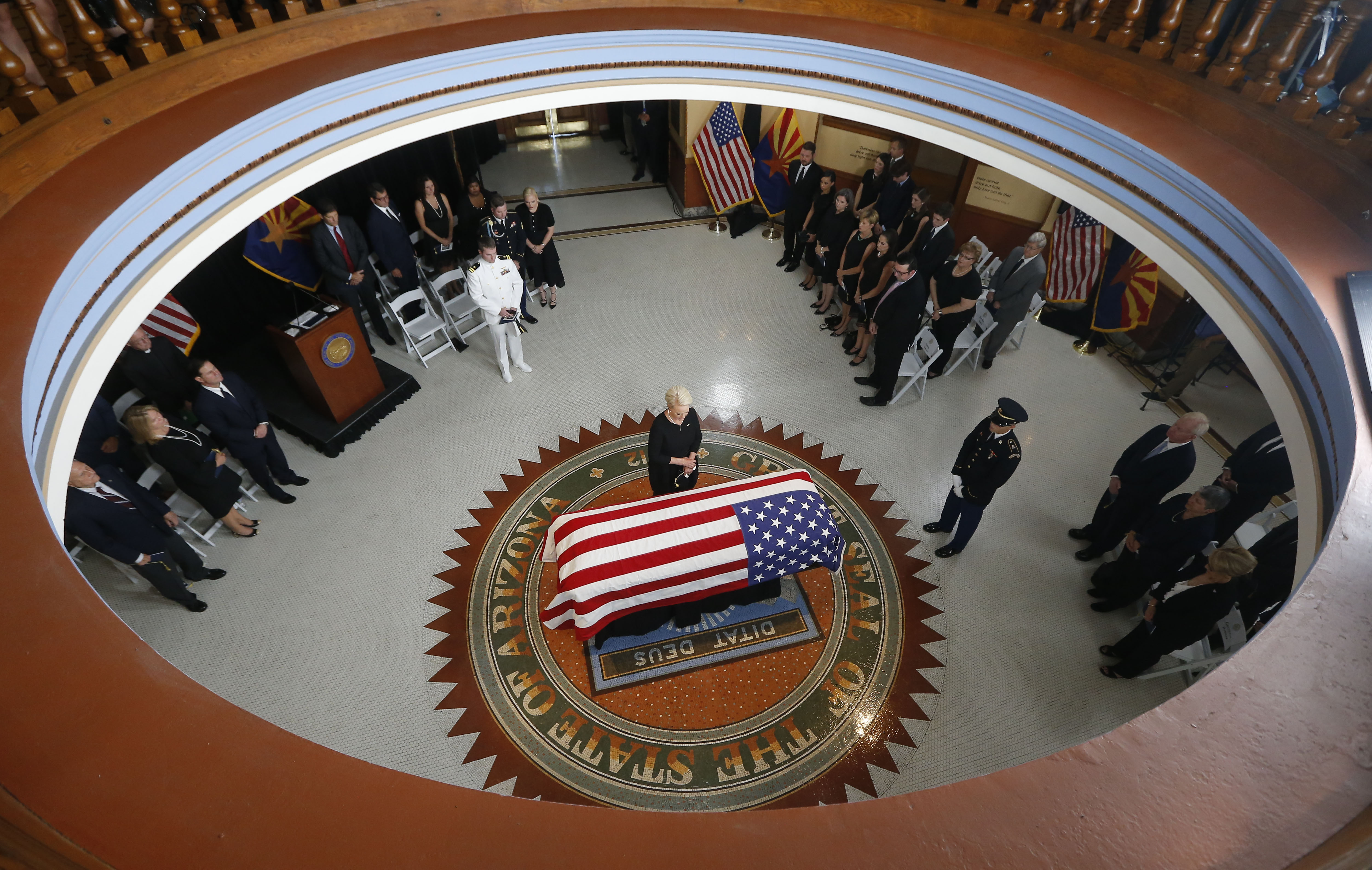 Cindy McCain, wife of, Sen. John McCain, R-Ariz. stands over the casket during a memorial service at the Arizona Capitol on August 29, 2018 in Phoenix, Arizona. Sen. McCain, a decorated war hero, died August 25 at the age of 81 after a long battle with Glioblastoma, a form of brain cancer.