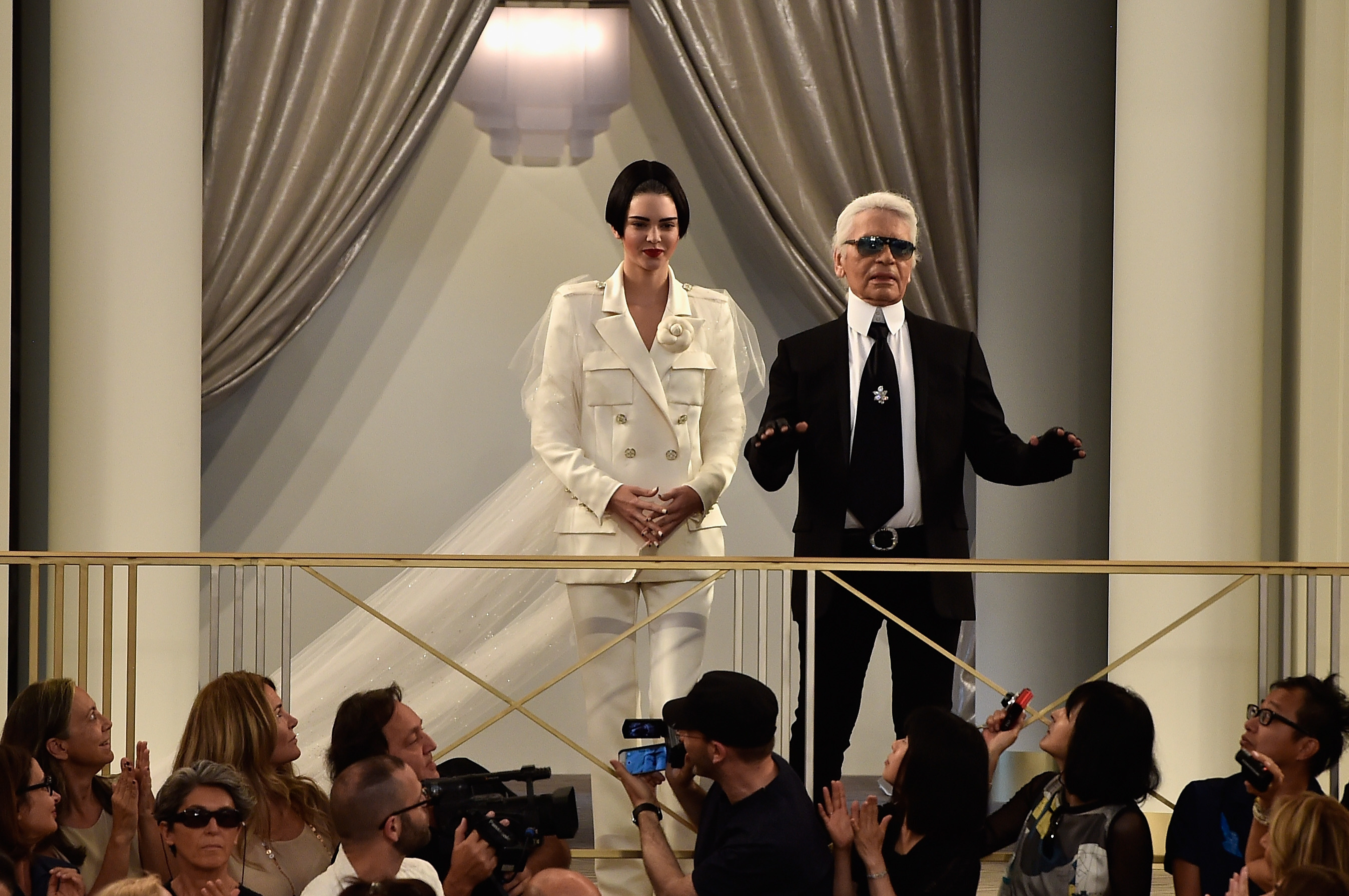 Kendall Jenner and Karl Lagerfeld walk the runway during the Chanel show as part of Paris Fashion Week Haute Couture Fall/Winter 2015/2016 on July 7, 2015 in Paris, France.