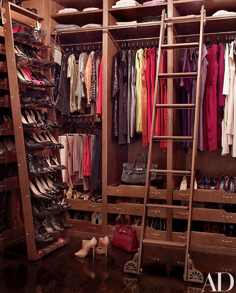 Shields’s closet, built of rift-sawn white oak, is outfitted with a rolling shoe rack and library ladder by Putnam Rolling Ladder Co.