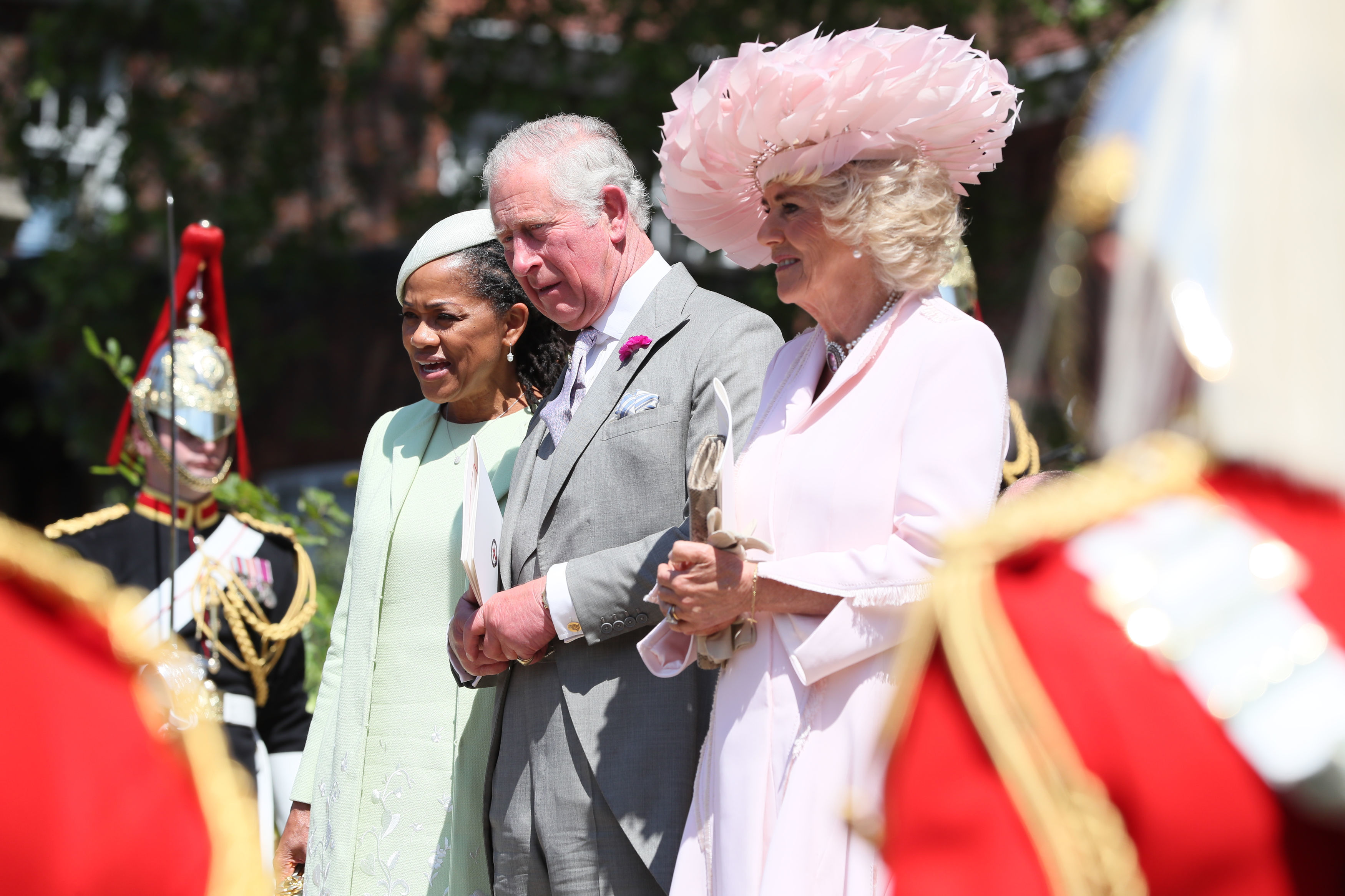 (L-R) Doria Ragland, Megan Markle's mother, Prince Charles, Prince of Wales and Camilla, Duchess of Cornwall leave St George's Chapel at Windsor Castle following the wedding of Prince Harry to Meghan Markle on May 19, 2018 in Windsor, England.