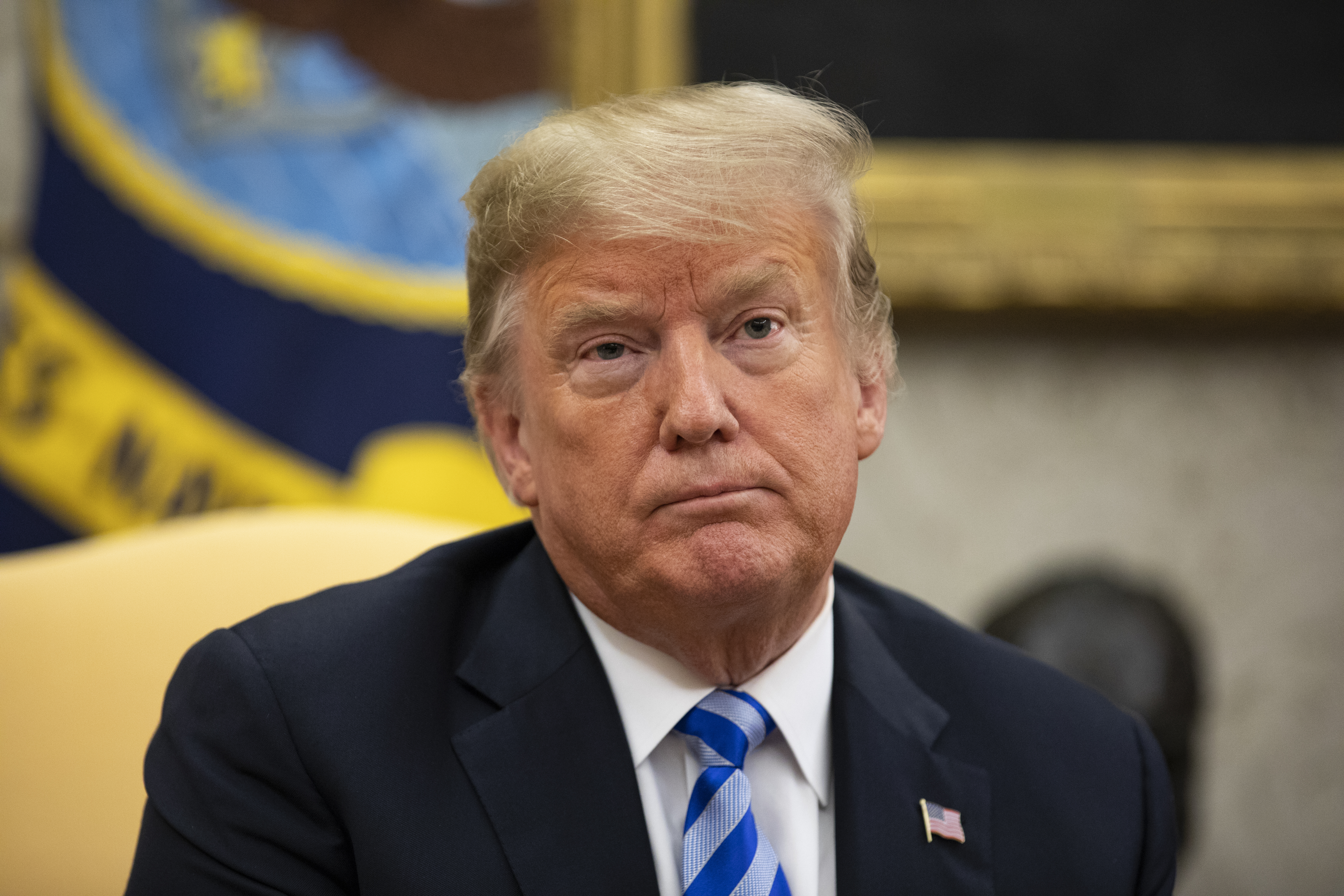 US President Donald Trump listens to a question as he meets with the Emir of Kuwait Jaber Al-Ahmad Al-Sabah in the Oval Office of the White House on September 5, 2018 in Washington, DC.