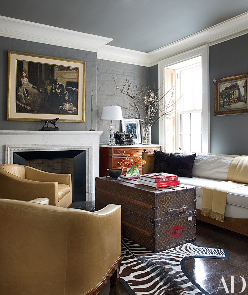 Ruhlmann-esque tub chairs by Stephen Miller Siegel face a vintage Louis Vuitton trunk given to Shields by her husband, Chris Henchy; the Directoire-style commode in the corner displays a George Hurrell portrait of the actress.