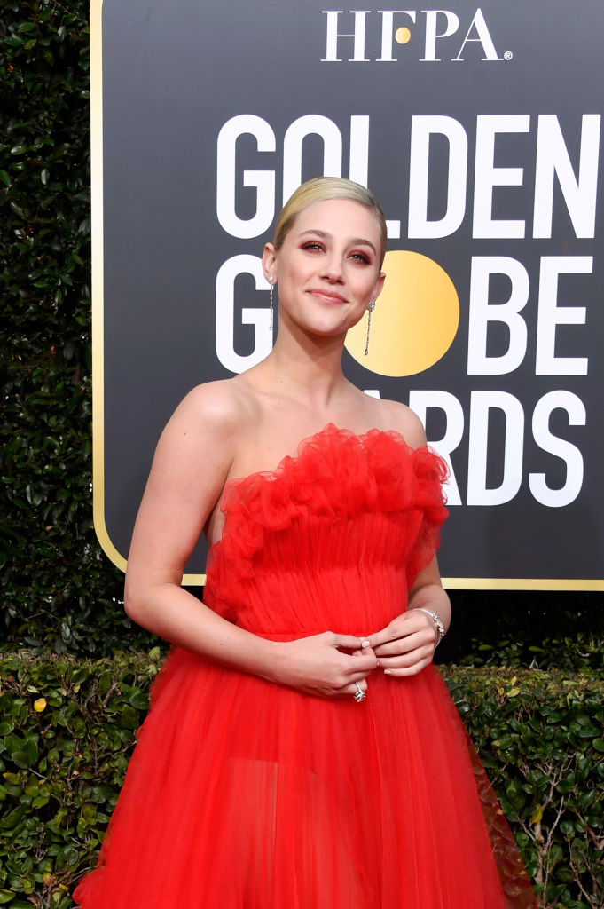 'Riverdale' star Lili Reinhart looks ravishing in red at the Golden Globes 2019 red carpet (Getty Images)