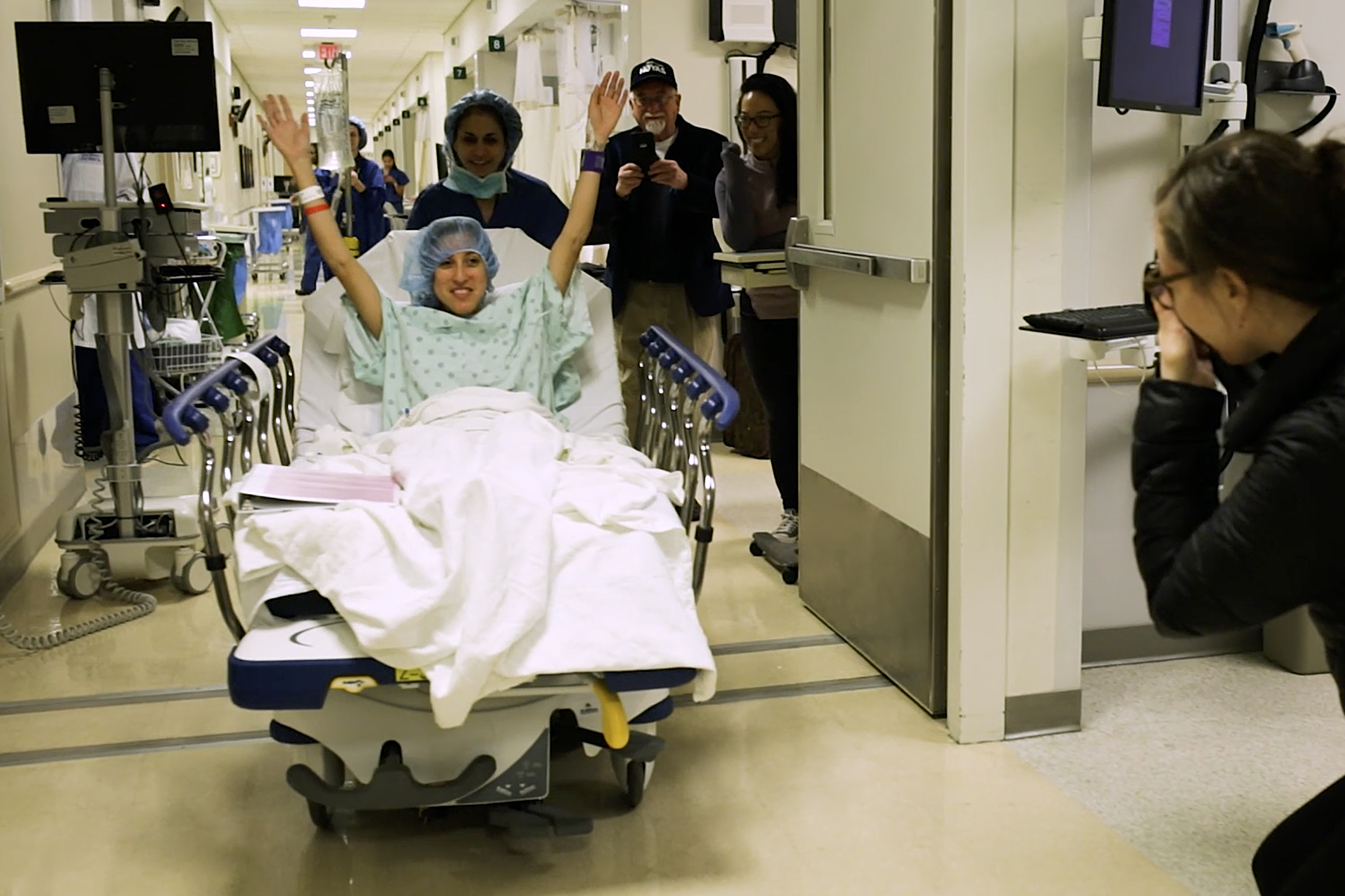 In this image made from video provided by Johns Hopkins Medicine, Nina Martinez of Atlanta is wheeled into a Baltimore operating room to become who is thought to be the world’s first kidney transplant living donor with HIV, on Monday, March 25, 2019. (AP)