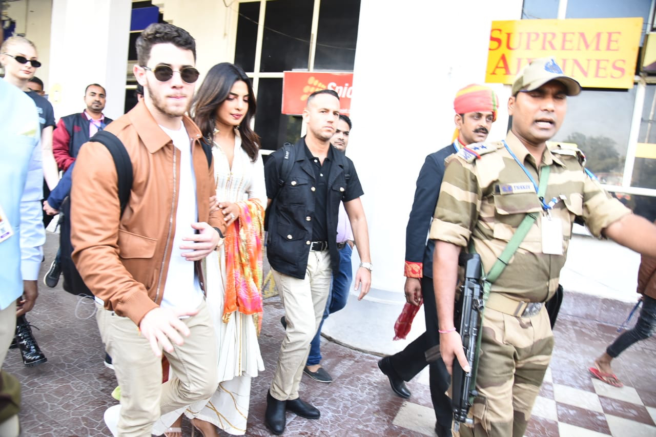 The couple arrived hand-in-hand at Jodhpur Airport for their impending wedding celebrations. (Meaww Photo)