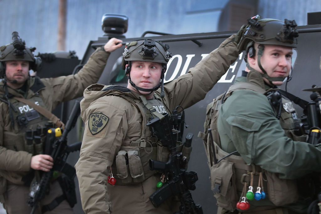 Police secure the area following a shooting at the Henry Pratt Company on February 15, 2019 in Aurora, Illinois. Five people were reported dead and 5 police officers wounded from the shooting. The gunman has been identified as Gary Martin, a 45-year-old man believed to be an employee at the company. (Photo by Scott Olson/Getty Images)