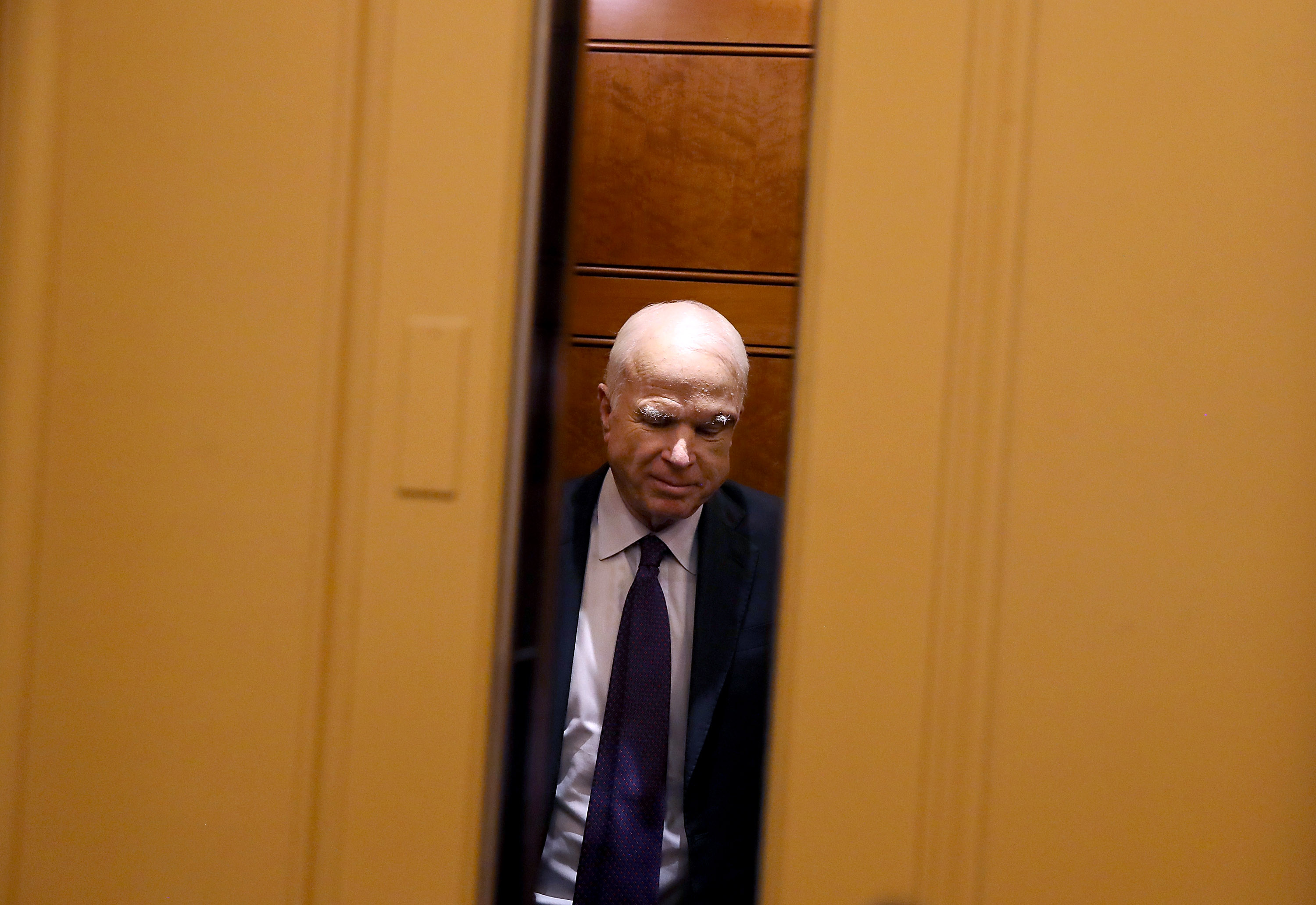 U.S. Sen. John McCain (R-AZ) takes an elevator to the U.S. Capitol on July 26, 2017 in Washington, DC. Sen. Paul was one of nine republican senators to vote against the health care bill in the Senate. The U.S. Senate will continue debate on the Better Care Reconciliation Act.